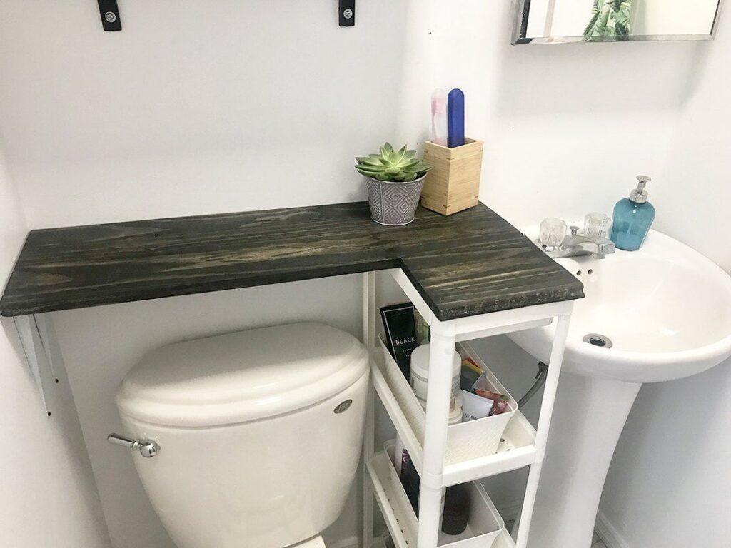 Small rooms need smart ideas to stay clear. Use the over-the-toilet shelves for a tall space. Add drawer dividers for small tools that slip away fast. Place baskets and bins under the sink for slow-use items. Hidden areas help hold mess and keep your view clean. These easy moves shape true bathroom storage solutions that feel real and safe.